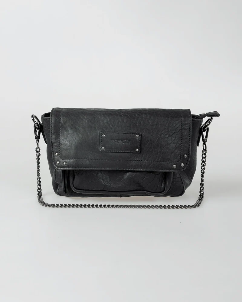 Bolso piel tachas