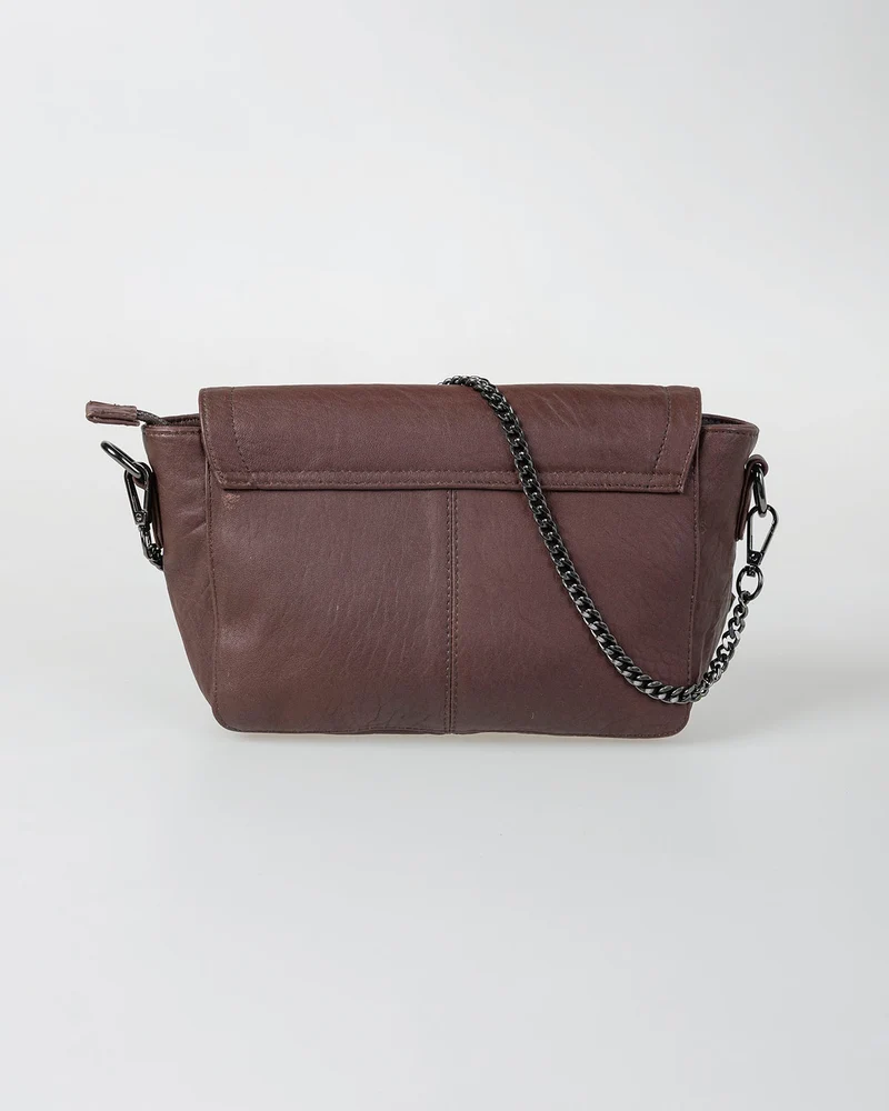 Bolso piel tachas