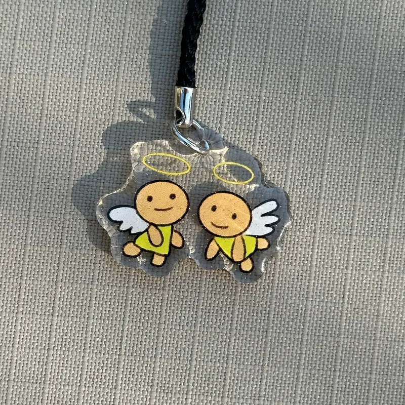 tama angels phone charm