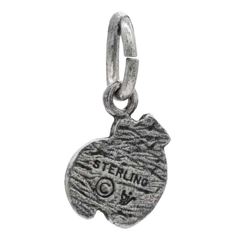 Charm de peltre alomántico