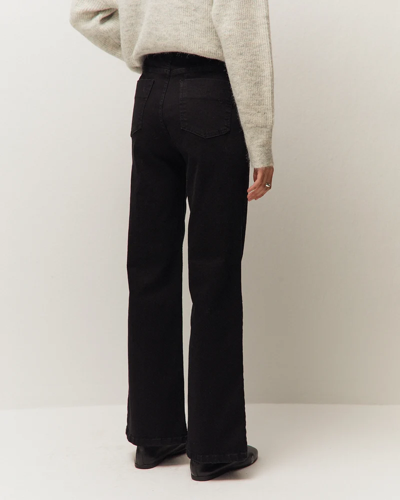 Pantalón denim con bolsillos de vivo