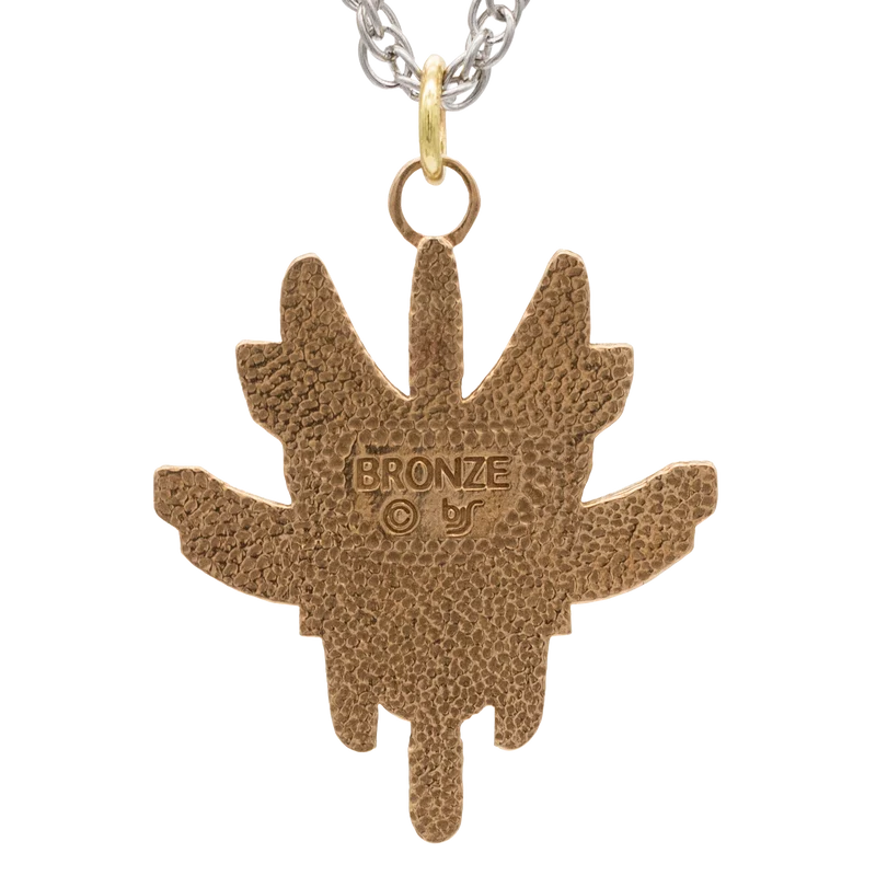 Glifo de los herreros de Ishi - Bronce