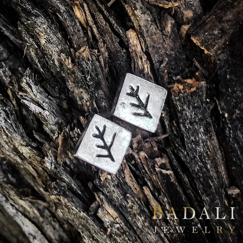 Pendientes de signo de anciano