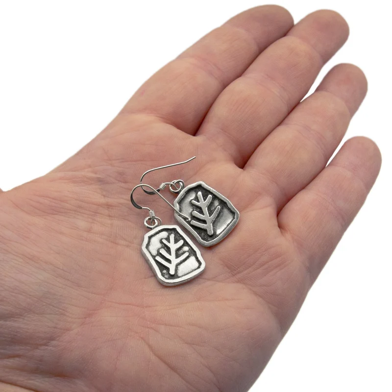 Pendientes de signo anciano